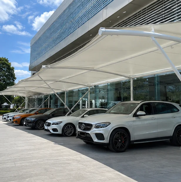 Cantilever tensile car parking shade with column-free entry side